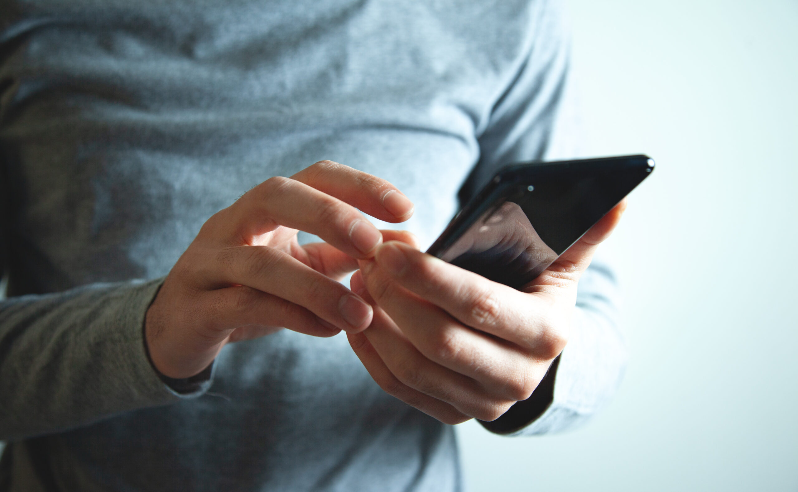 the business man using smartphone